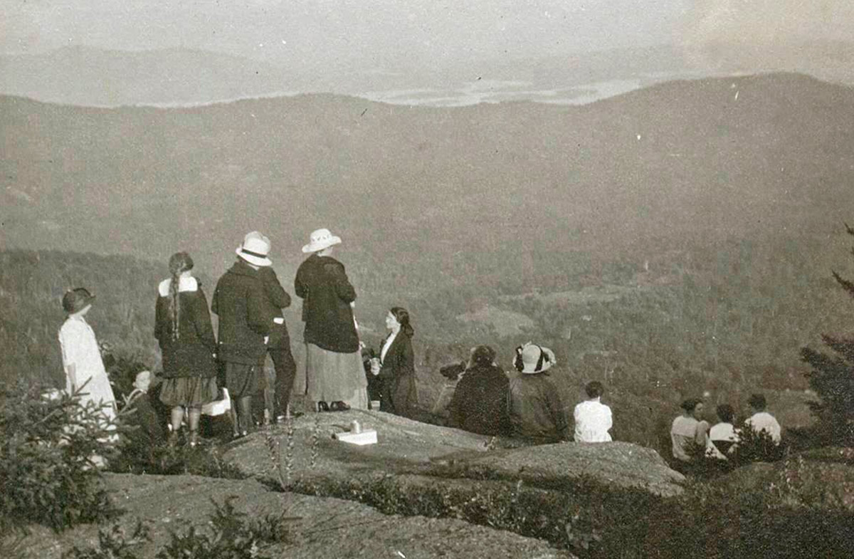 Archival image of people exploring on Mountain Day