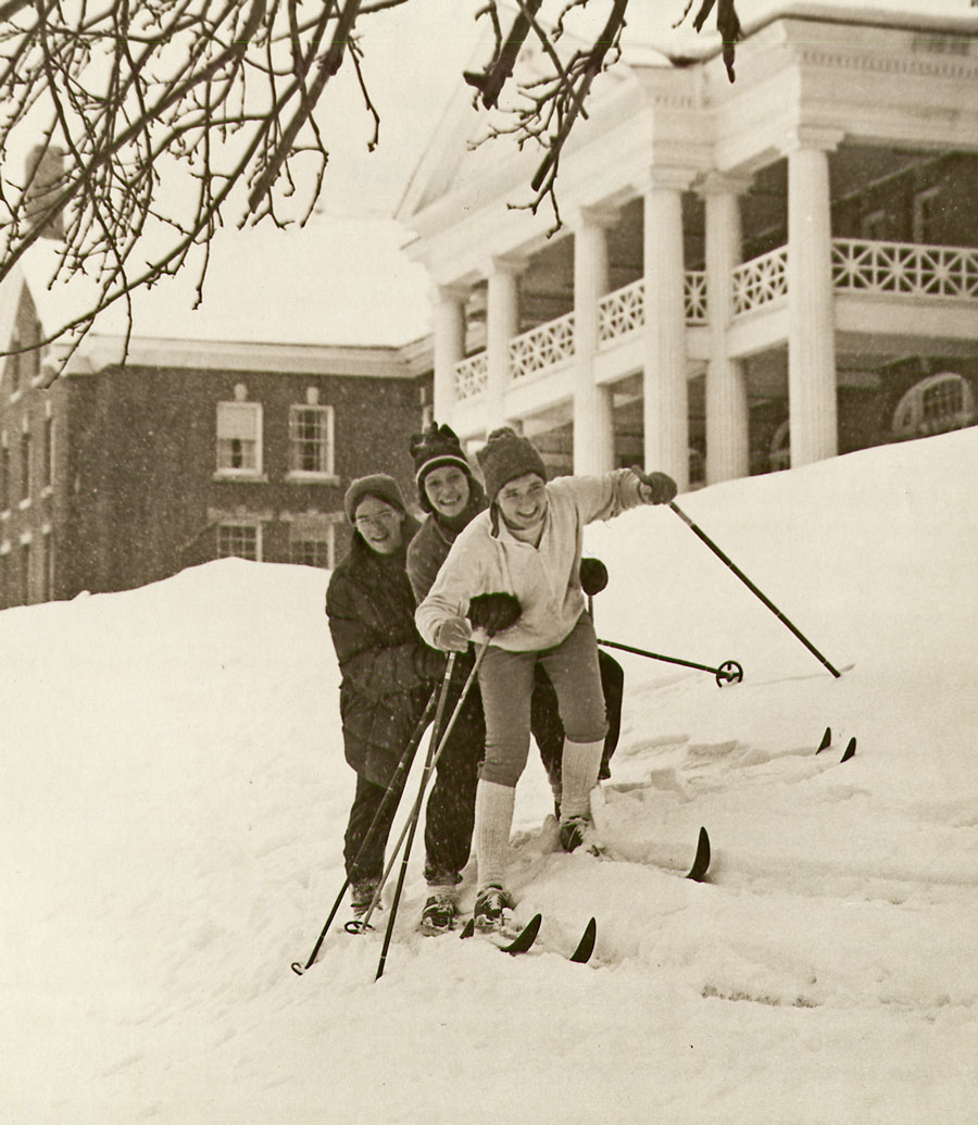 Students skiing on campus