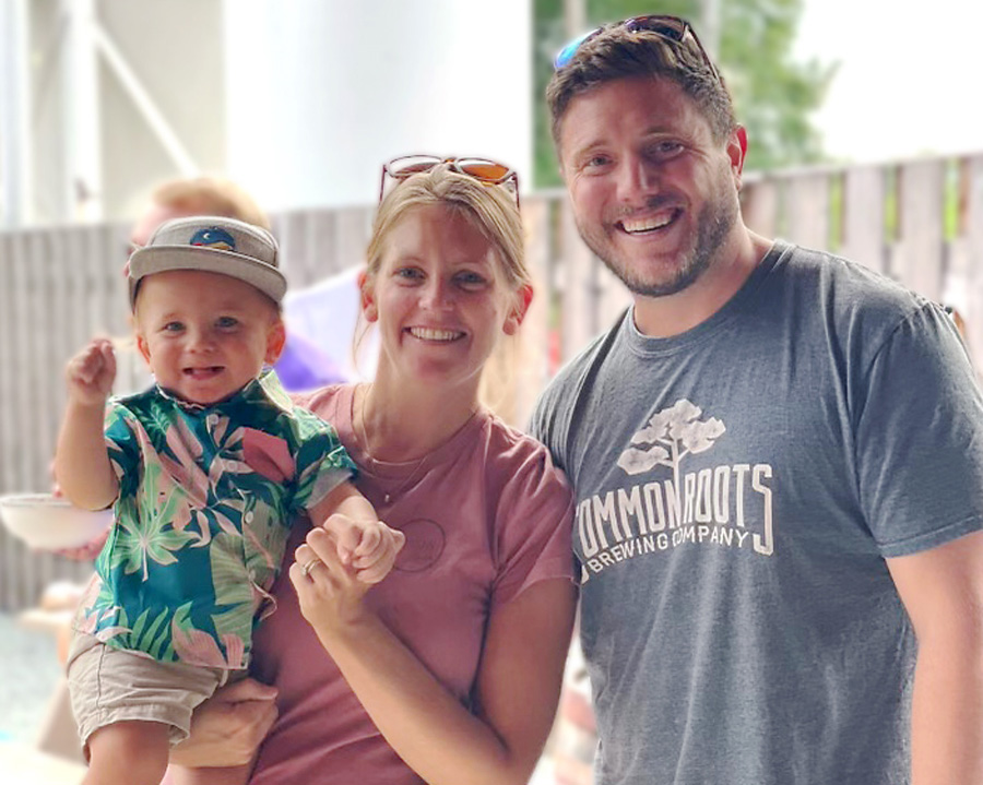Christian Weber with his wife and son