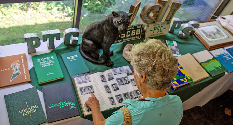 Susan Tsetsilas ’68 at the memorabilia table during Summer Reunion.