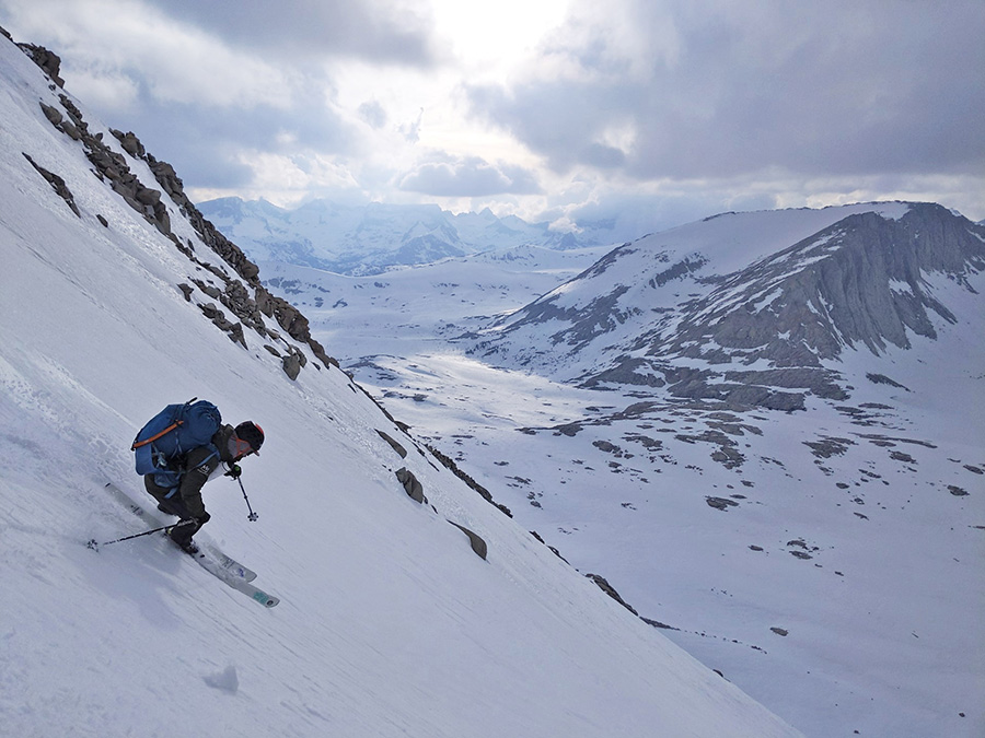 Portrait photograph of Ryan Carey '08 in his snow ski gear skiing Mt Barnard on a four-day ski traverse from mount Whitney to Shepherds Pass in the Sierra Nevada on an overcast day