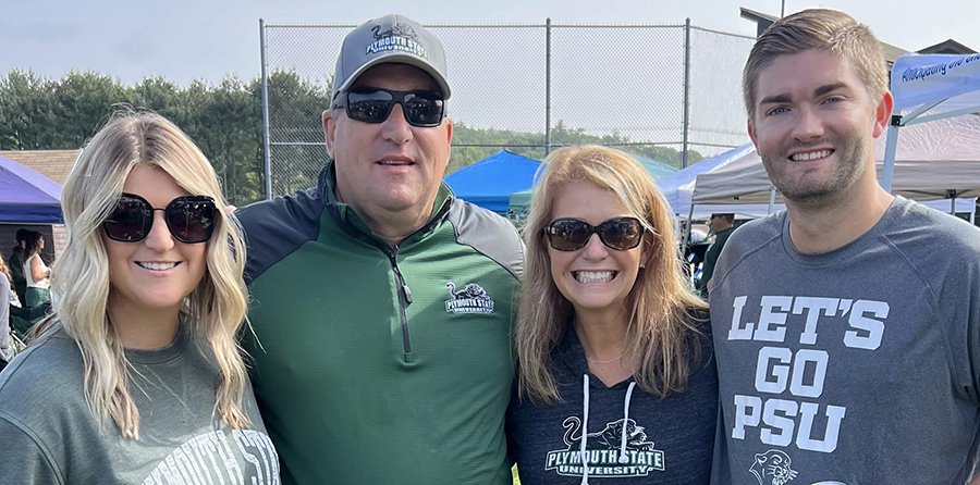 Sullivan Family taking a family photo at the 2023 PSU homecoming